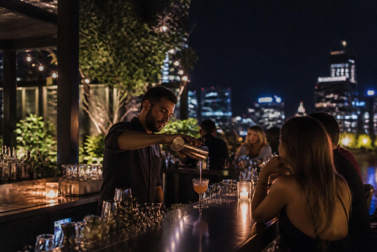 Rooftop bar in South End Charlotte with skyline views at night